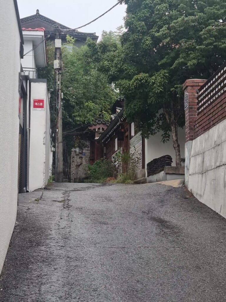 Quiet residential alley with traditional hanok houses near Bukchon Hanok Village