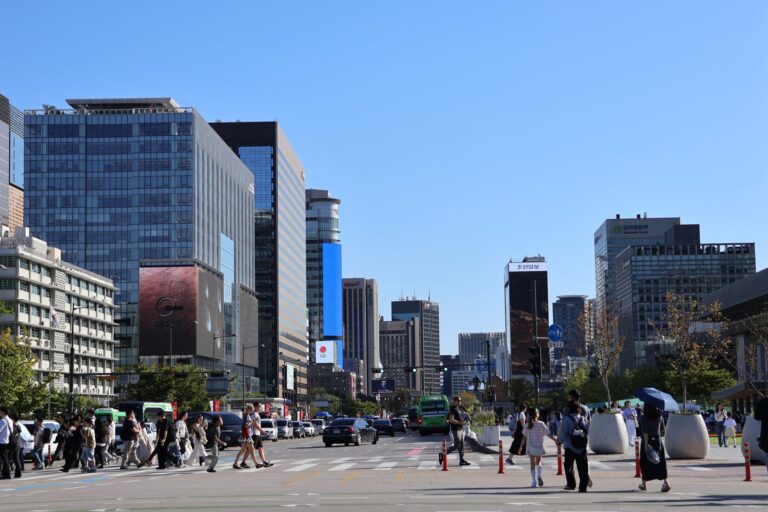 Jongno street with modern buildings and pedestrians in central Seoul