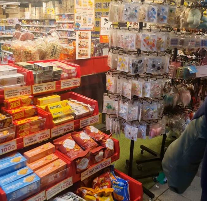 Namdaemun Market shop selling Korean snacks, food, and souvenirs in Seoul
